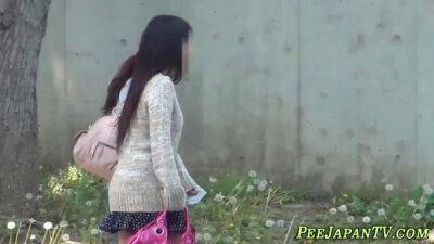 Classy lady pissing outdoors - sunporno.com - Japan