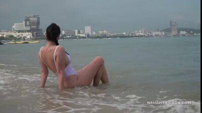 Naughty Russian MILF in White see thru swimsuit outdoors in public resort - sunporno.com - Russia